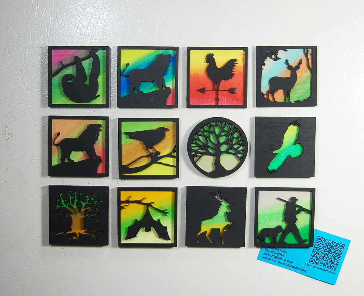 Group shot of hand-painted basswood Great Outdoors magnets
