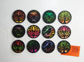 Group shot of colorful round hand-painted basswood magnets
