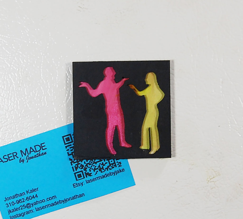 Hand-painted basswood magnet with two colorful figures