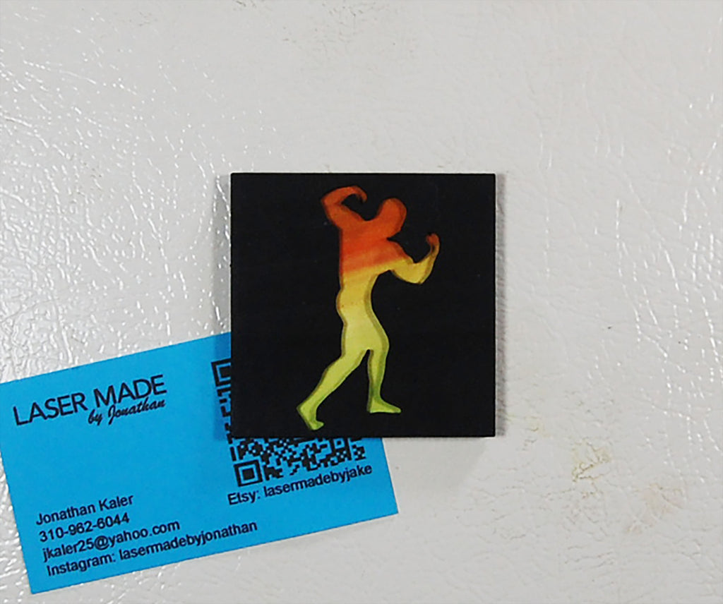 Hand-painted basswood magnet with a colorful figure