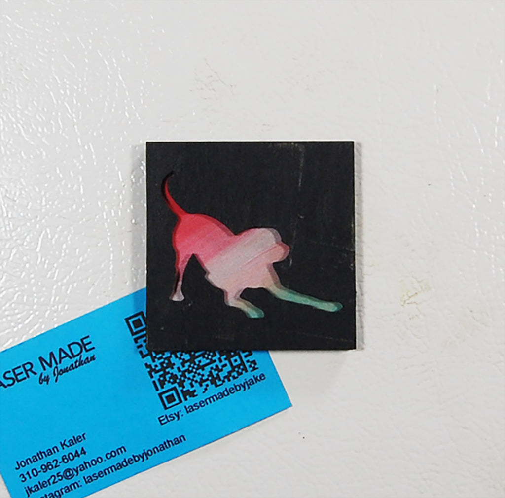 Hand-painted basswood magnet featuring a colorful dog