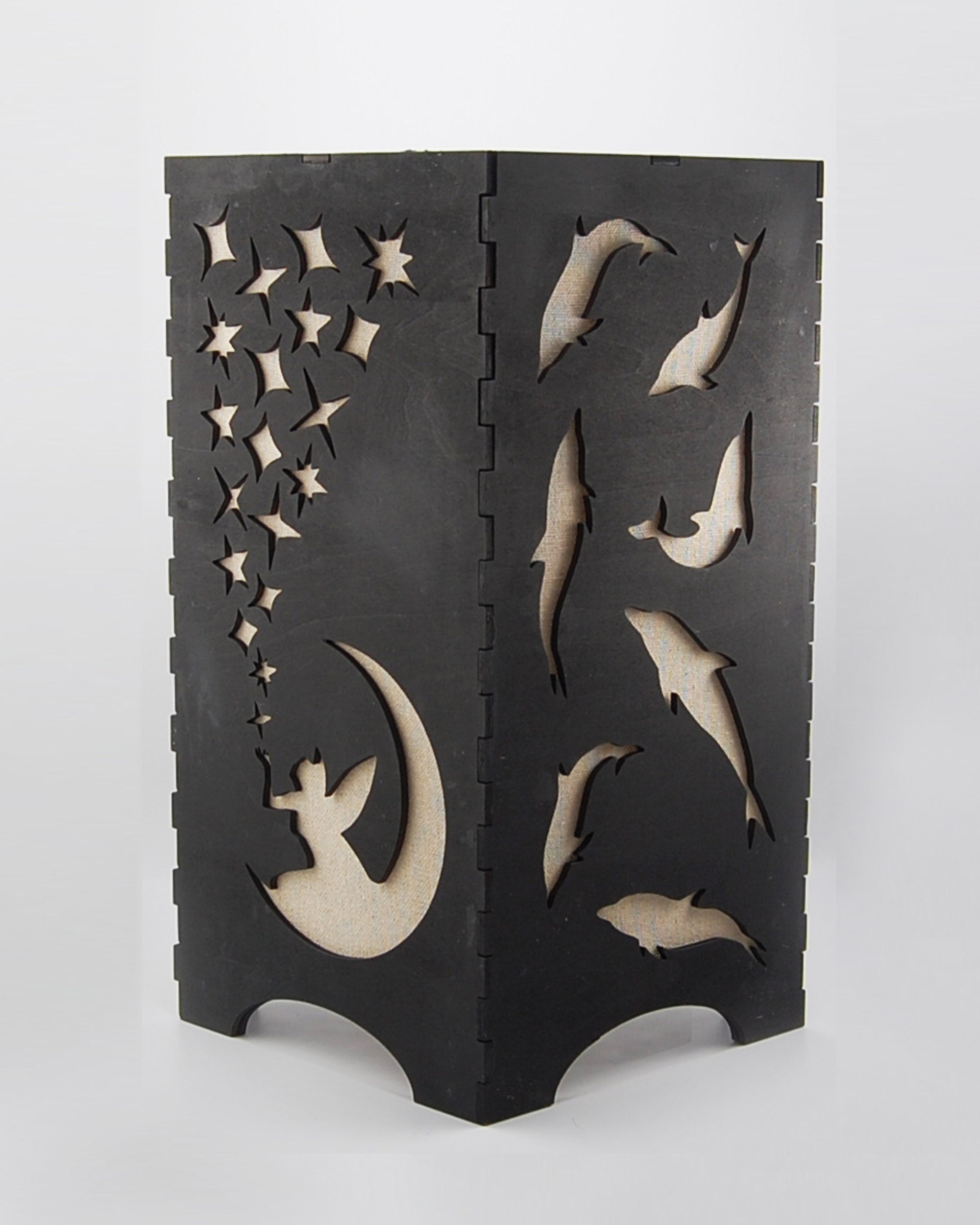 Fairies and dolphins lantern unlit, front view showing moon and star cutouts