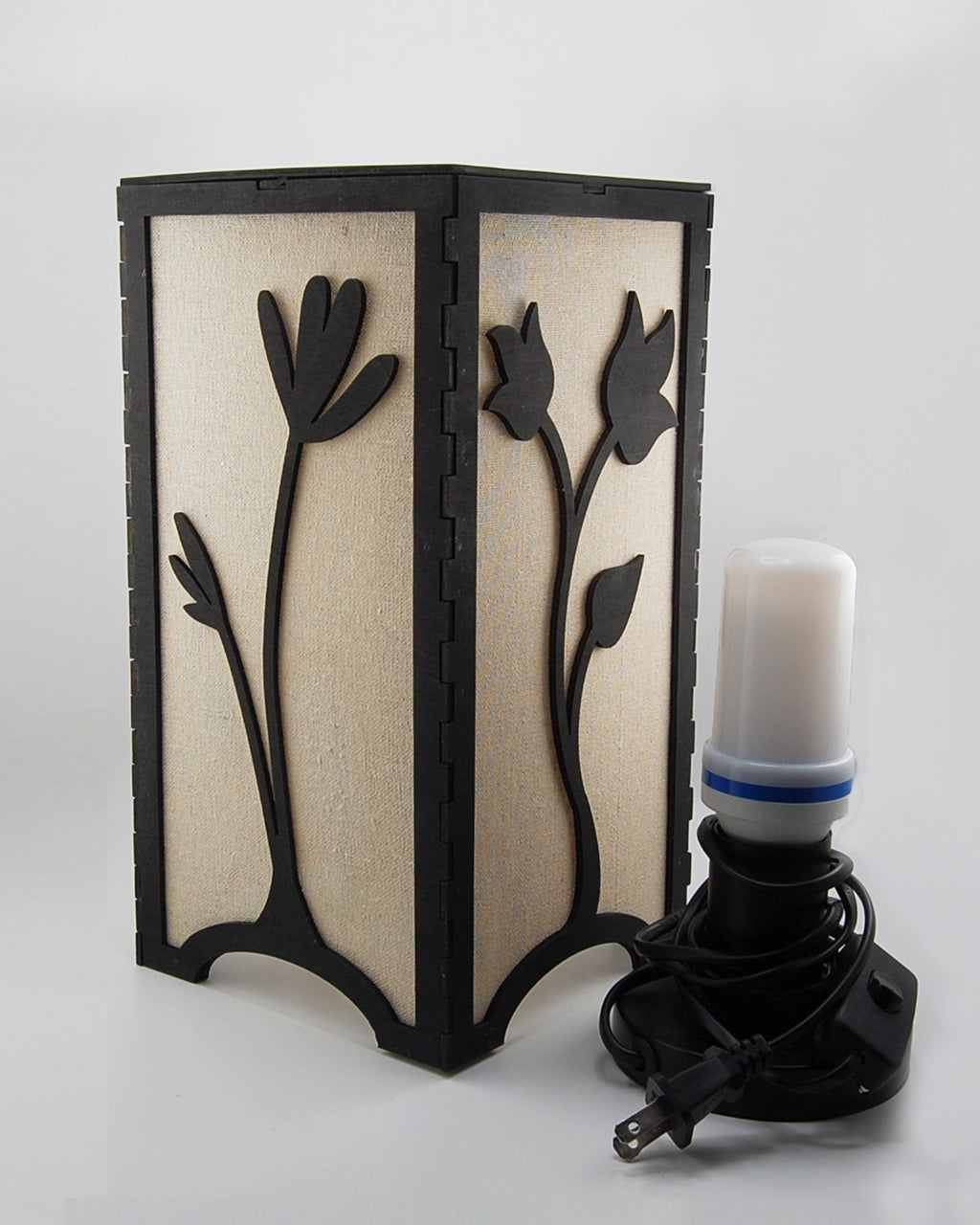 Floral tulip lantern with bulb base and flickering bulb shown beside it