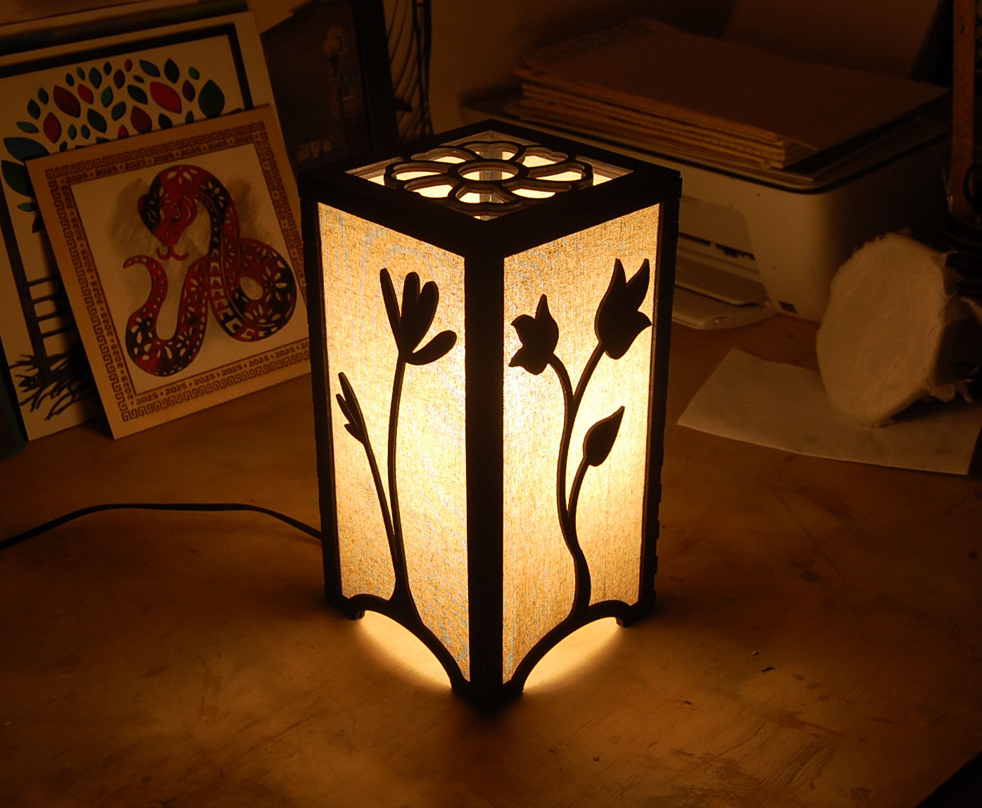 Floral sunflower lantern glowing warmly when lit