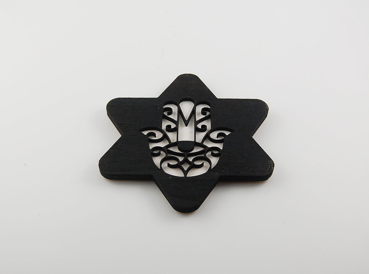 Star-shaped coaster with a Hamsa and eye design in laser-cut linework