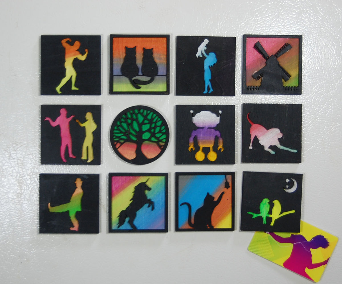 Collection of twelve colorful hand-painted basswood magnets