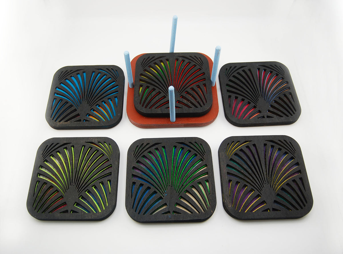 Six square laser-cut Deco coasters arranged in two rows